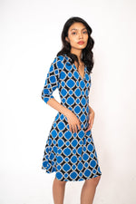 Load image into Gallery viewer, Carly - Printed Knit Wrap Dress
